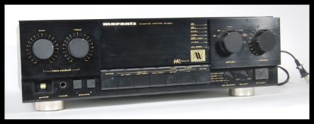 A 20th Century Marantz amplifier, having a black f