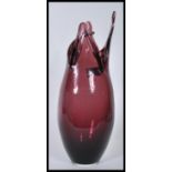 A 20th Century purple amethyst studio glass vase o