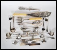 A collection of silver plated flatware to include