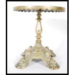 A Victorian 19th Century brass trivet stand, havin