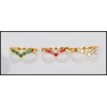 Three interlocking 18ct gold wishbone rings set wi