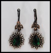 A pair of silver Renaissance style drop earrings s