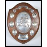 A early 20th Century armorial oak shield back boxi