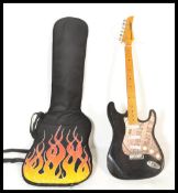 A Stratocaster style electric six string guitar Ha