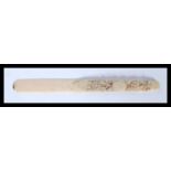 A 19th Century carved ivory page turner bookmark h