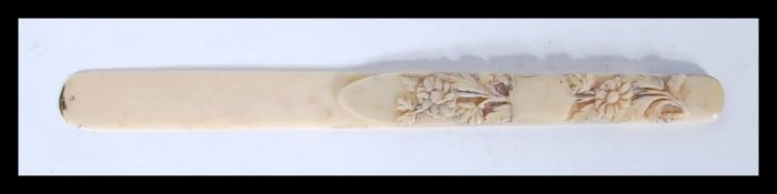 A 19th Century carved ivory page turner bookmark h