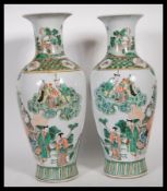 A matching pair of 20th Century Chinese famille ro