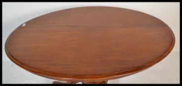 A 19th century High Victorian walnut tilt top brea