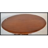 A 19th century High Victorian walnut tilt top brea