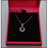 A stamped 750 18ct white gold pendant necklace hav