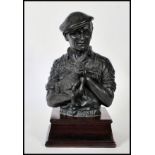 J Anne Butler ( British 20th century ) A cold cast bronze finish sculpture entitled ' Ike ' being