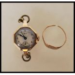 A hallmarked 9ct gold mid 20th Century Aviva wrist watch having a round face and hexagonal shape