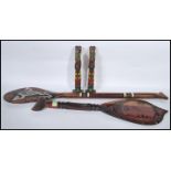 A collection of 20th Century possibly Polynesian ceremonial tribal items to include two non matching