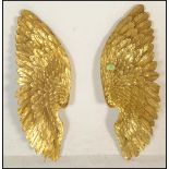 A pair of decorative wall hanging gilt wood carved angle wings, hanging points to the verso.