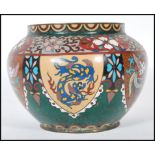 A 19th Century Chinese Cloisonne vase of squat from having panels depicting dragons and phoenix with
