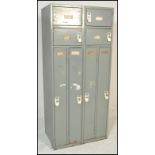 A retro 20th Century industrial factory locker of unusual configuration, for small lockers over four
