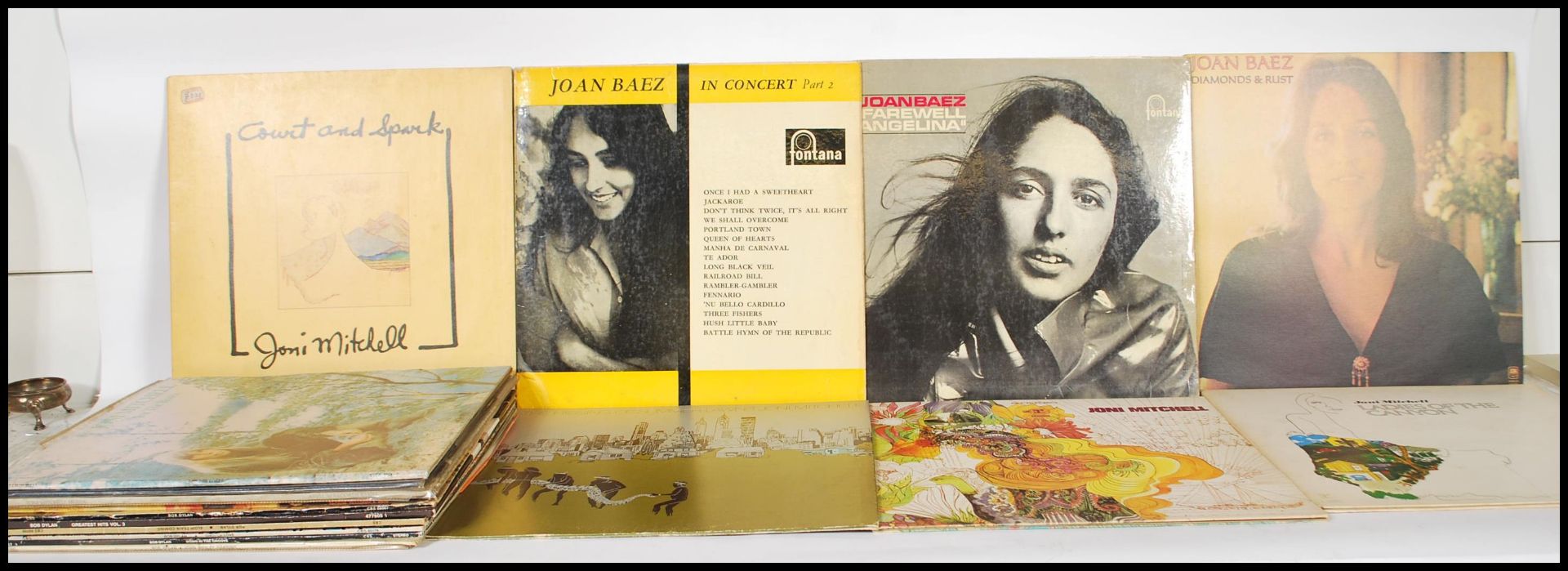 A collection of vinyl long play LP vinyl folk records by Bob Dylan, Joni Mitchell and Joan Baez. Bob