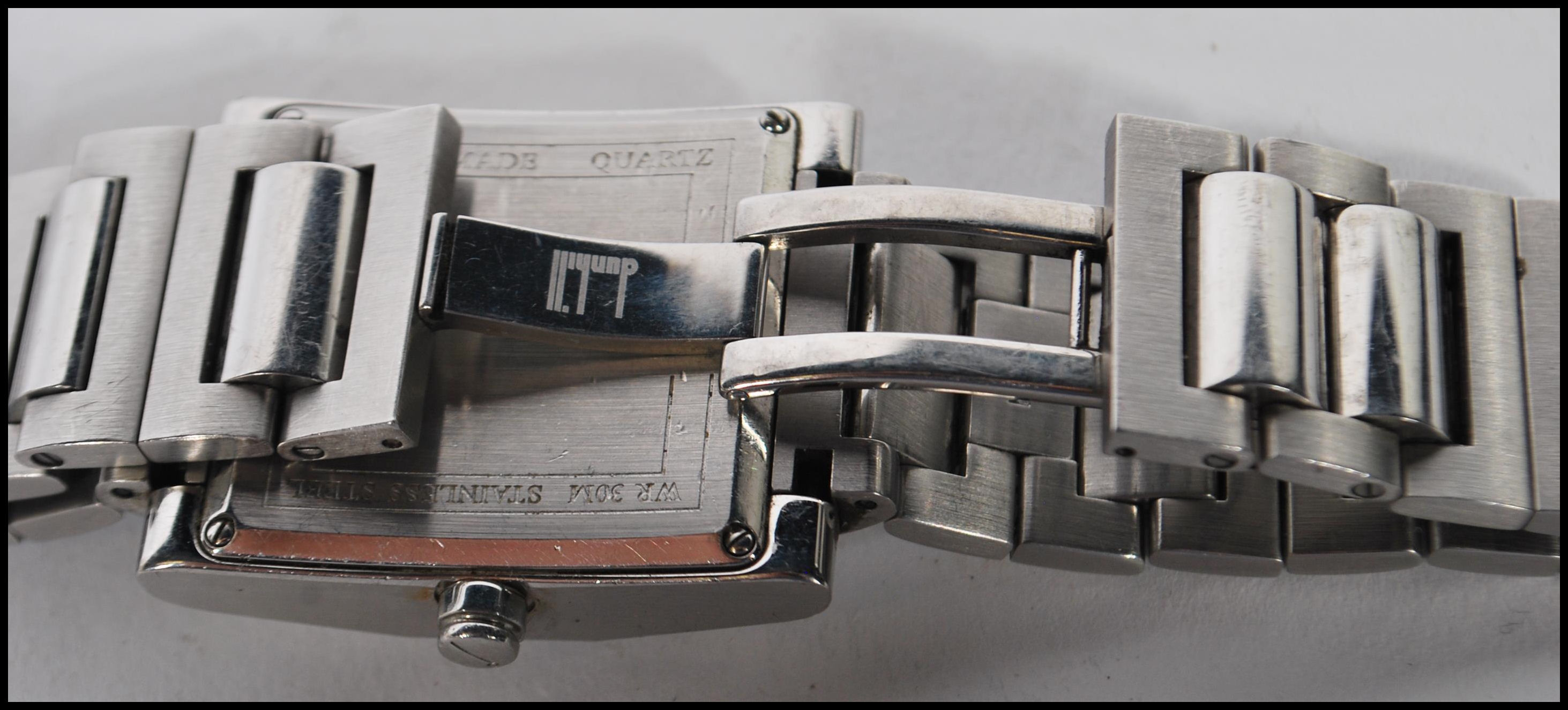 A gentleman's Dunhill facet watch having a square face with arabic numerals and baton markers to the - Image 4 of 5