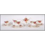 A Royal Albert bone China tea service in the ' Old Country Roses ' pattern consisting of teapot,