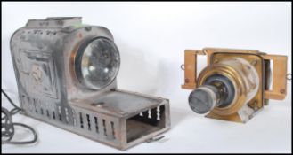 A Walter Tyler New Pattern Helioscopic Lantern having an 8" brass fish eye lens with a wooden  slide