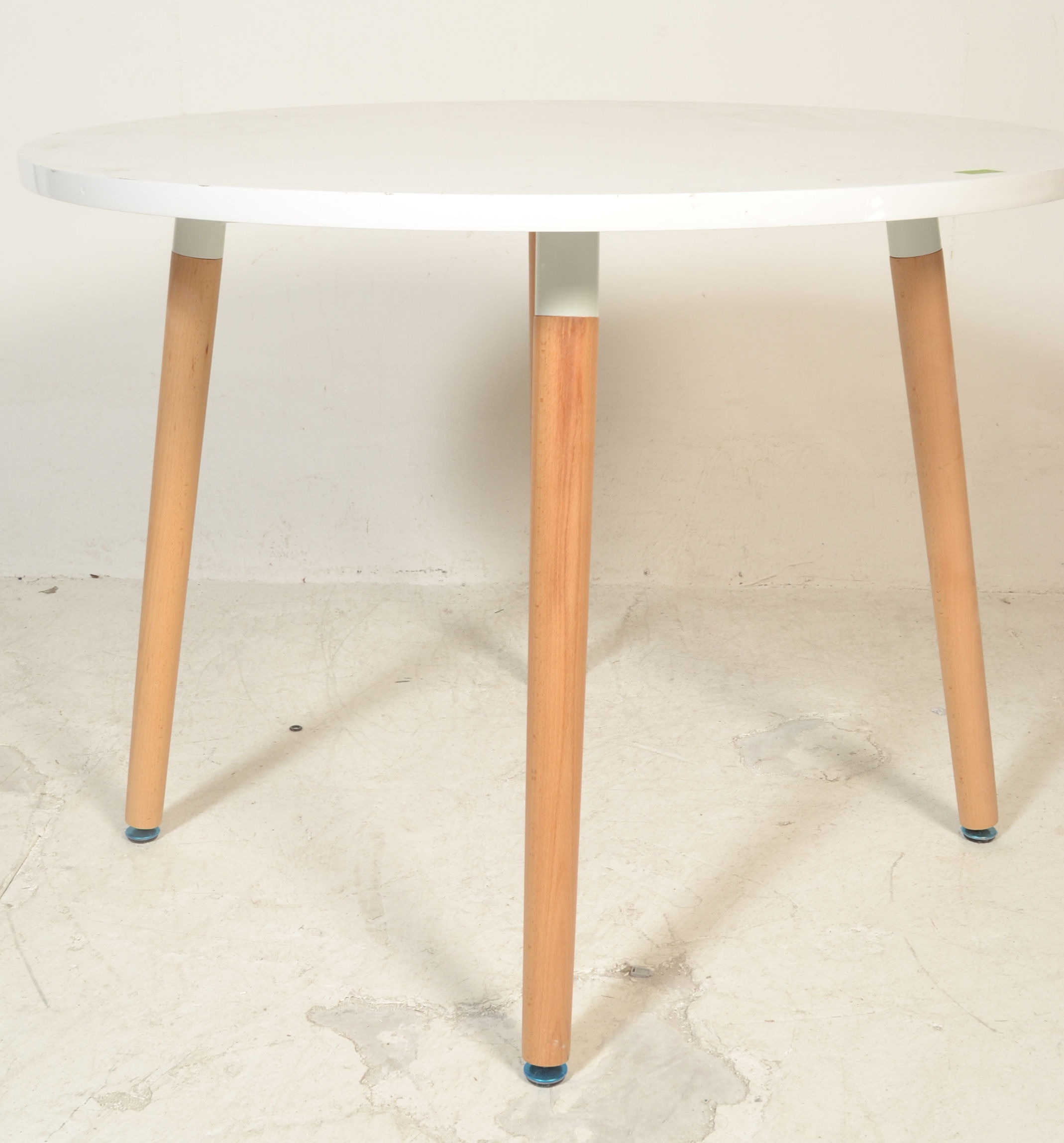 A contemporary white laminated and ash circular dining table. The table comprising of a laminated - Image 7 of 8