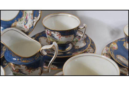 A Royal Doulton coffee and tea service stamped with factory stamp to base, Reg. No. 708898, hand- - Image 12 of 13