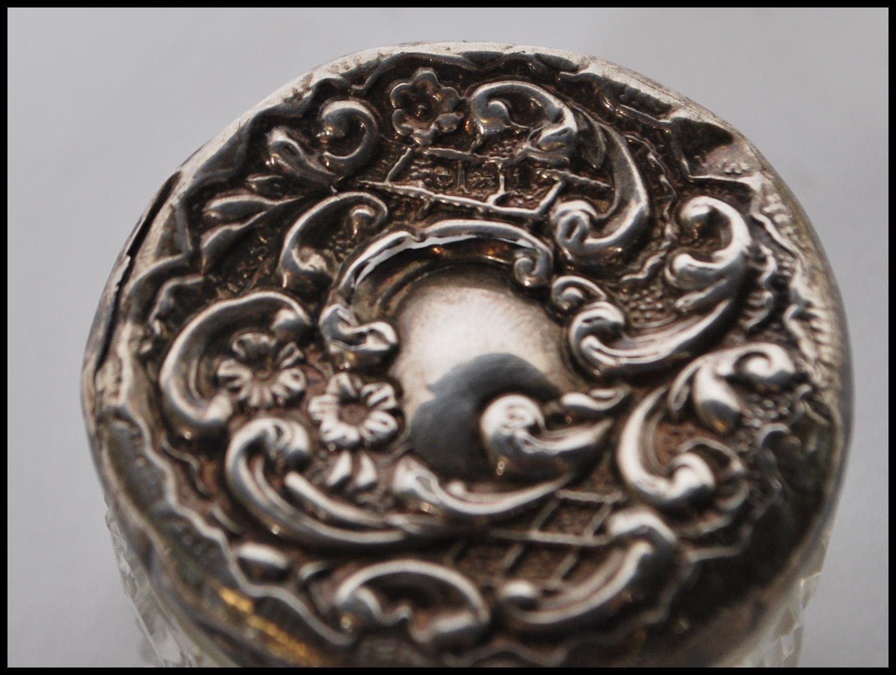 A group of early 20th Century silver topped and cut glass bodied dressing table pots, most having - Image 5 of 11