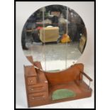 A 1950's Art Deco drop centre dressing table. Rais