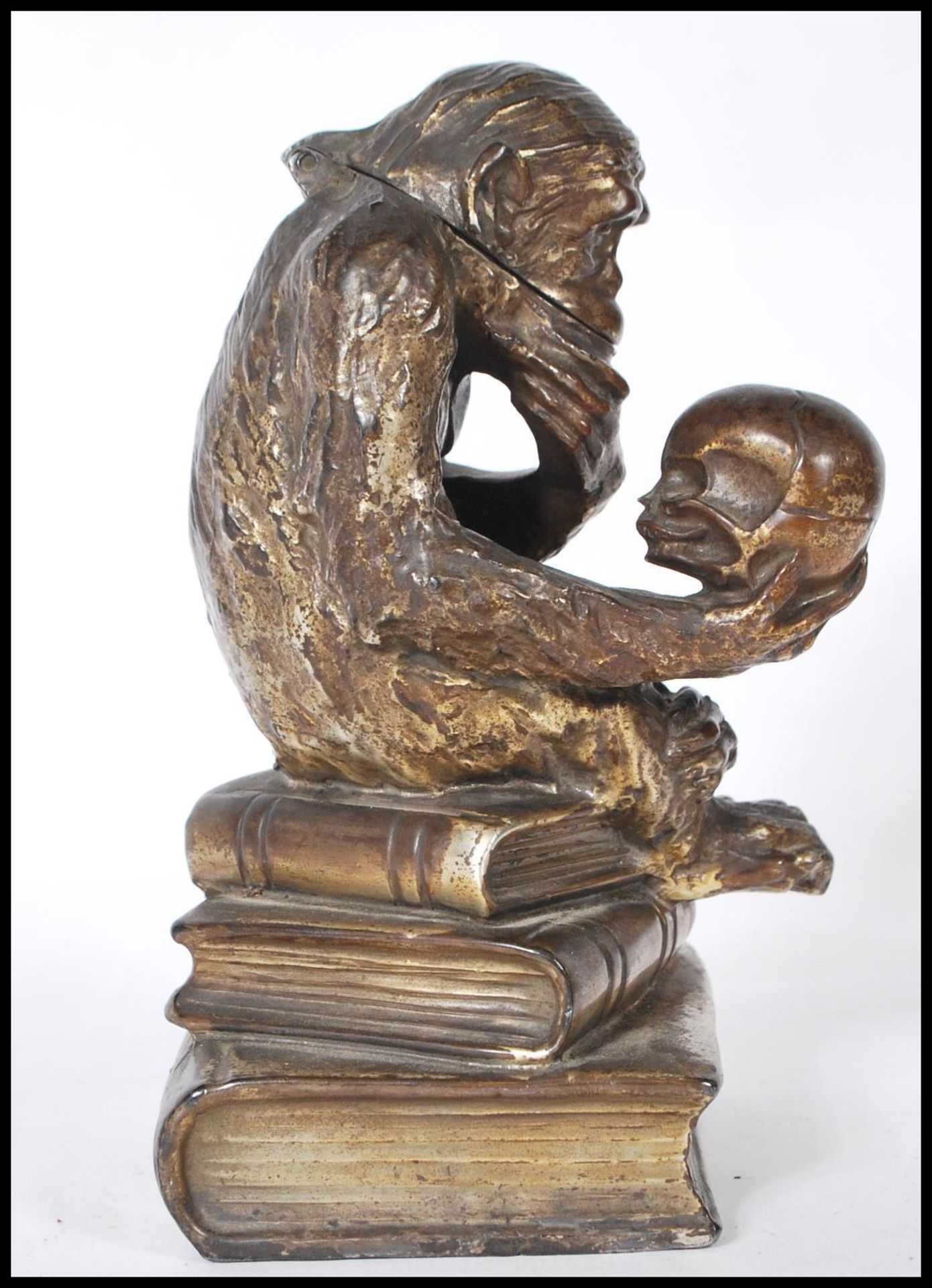 A Darwinian style cast metal novelty table cigarette / cigar lighter, in the form of a seated monkey - Image 3 of 8