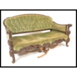 A 19th Century Victorian mahogany two seater sofa