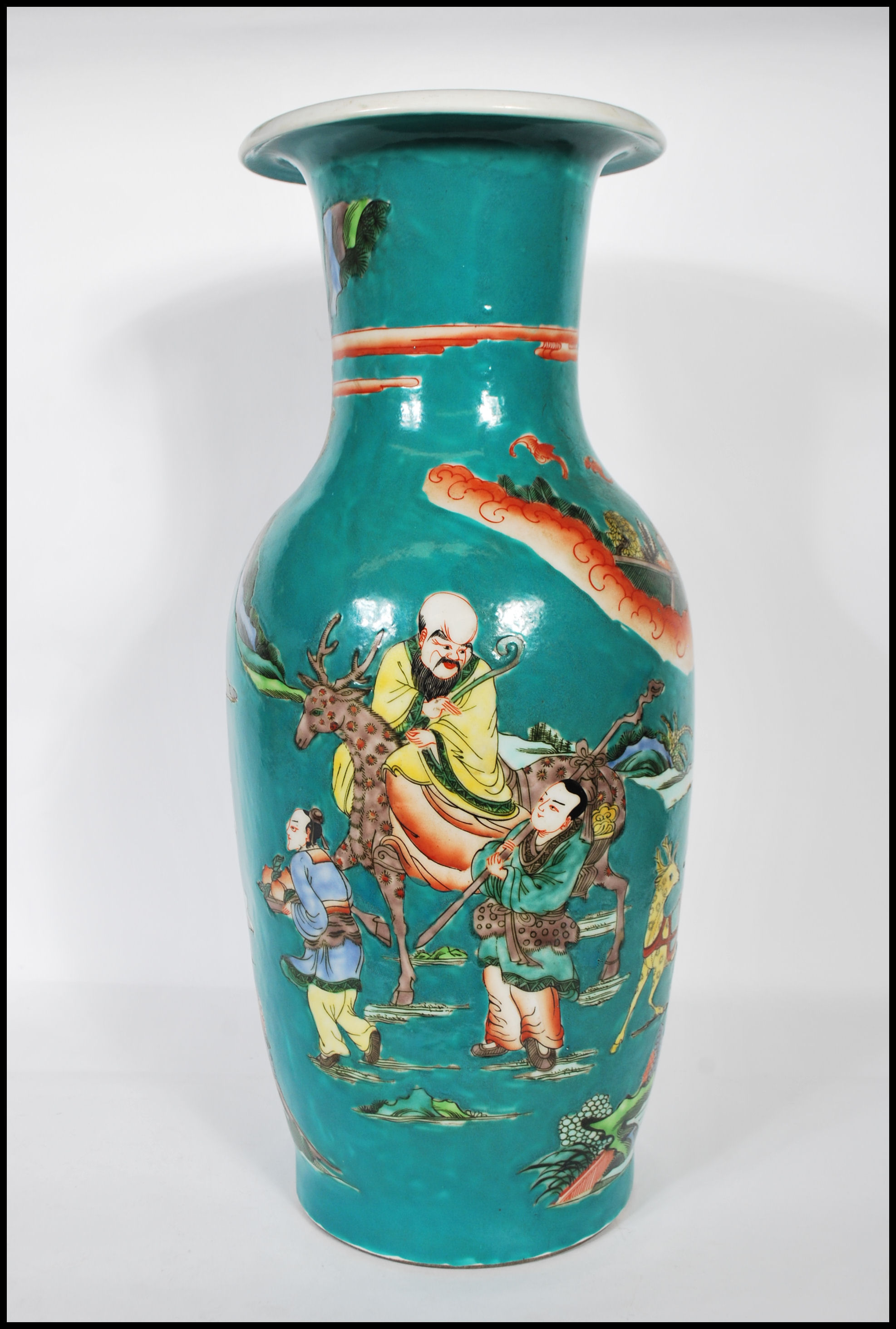 A 20th Century Chinese large porcelain temple vase having teal ground with hand painted and