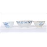 A group of 19th and 18th Century Chinese porcelain tea bowls to include two Tek Sing cargo blue