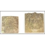Two composite stone garden ornaments / plaques, on