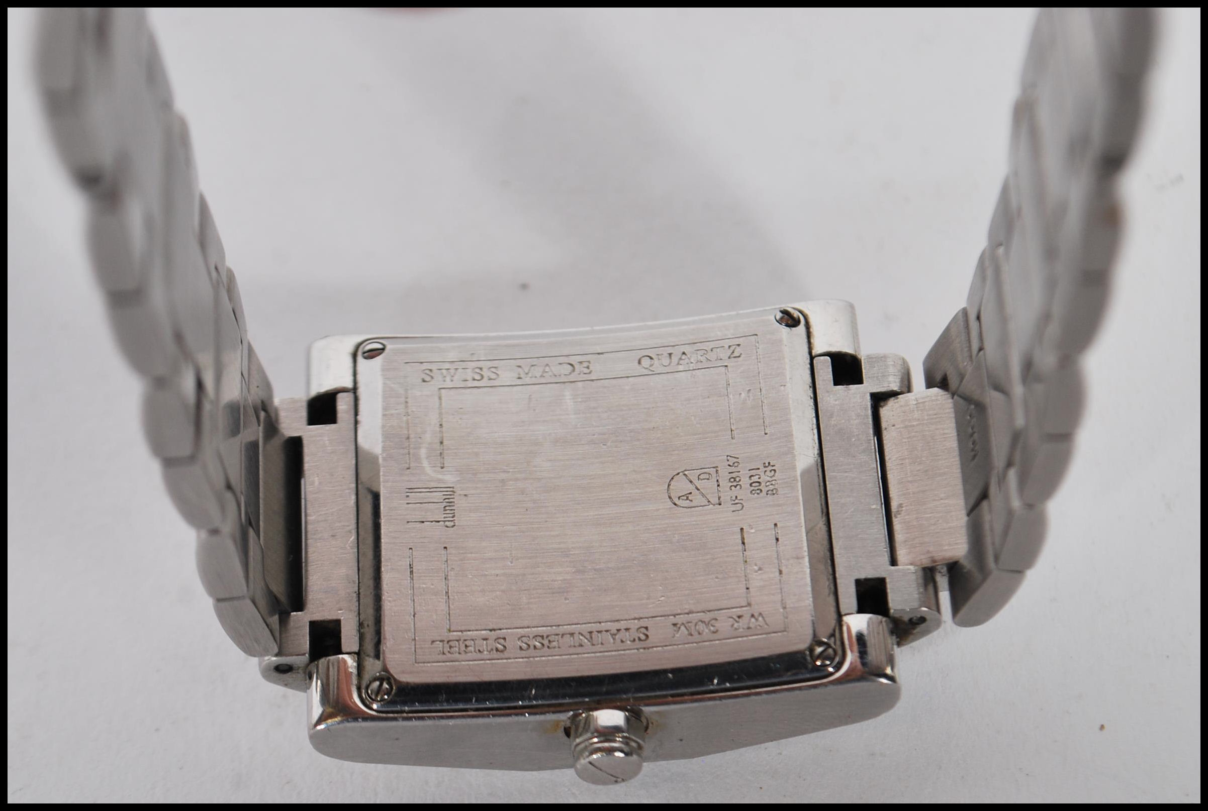 A gentleman's Dunhill facet watch having a square face with arabic numerals and baton markers to the - Image 5 of 5