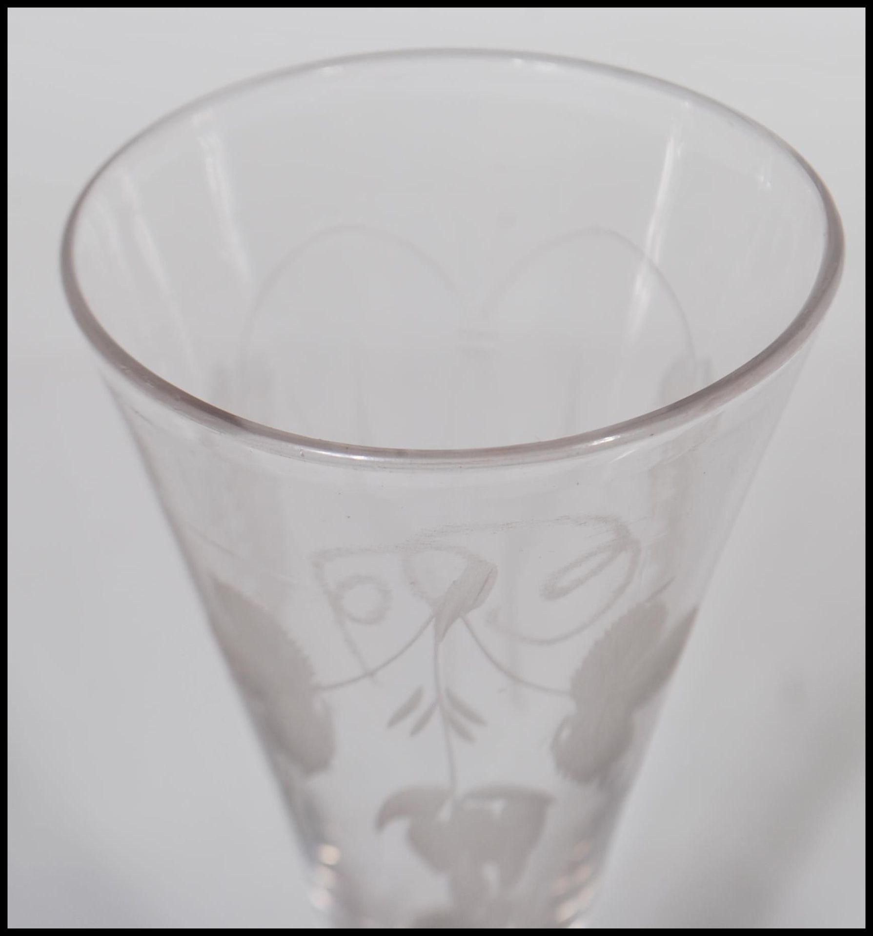 A 18th / 19th Century Georgian cut glass toddy lifter together with a Georgian etched wine glass - Image 7 of 7