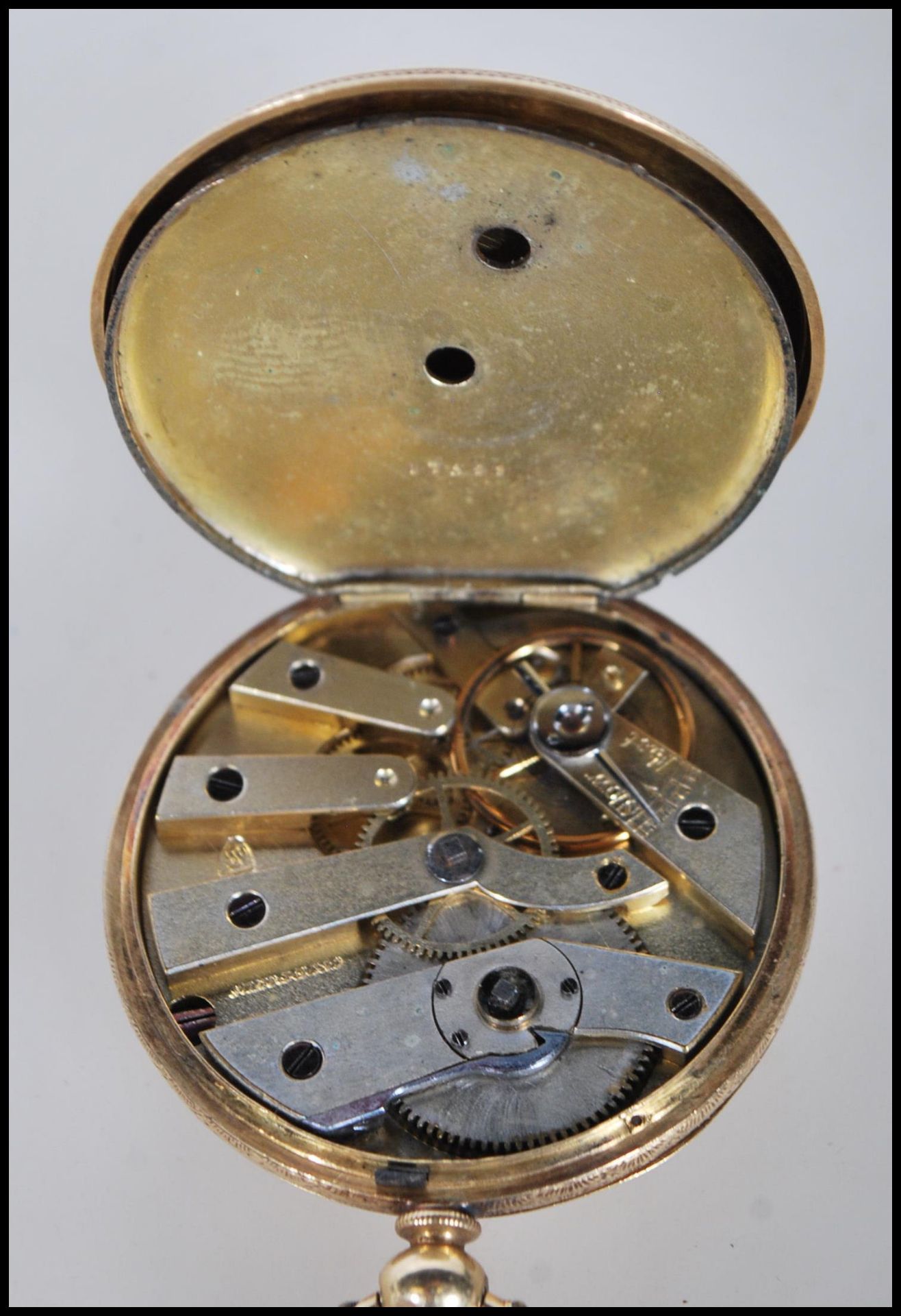 A vintage 18ct gold open faced pocket watch having a gilt face with roman numerals to the chapter - Image 6 of 7