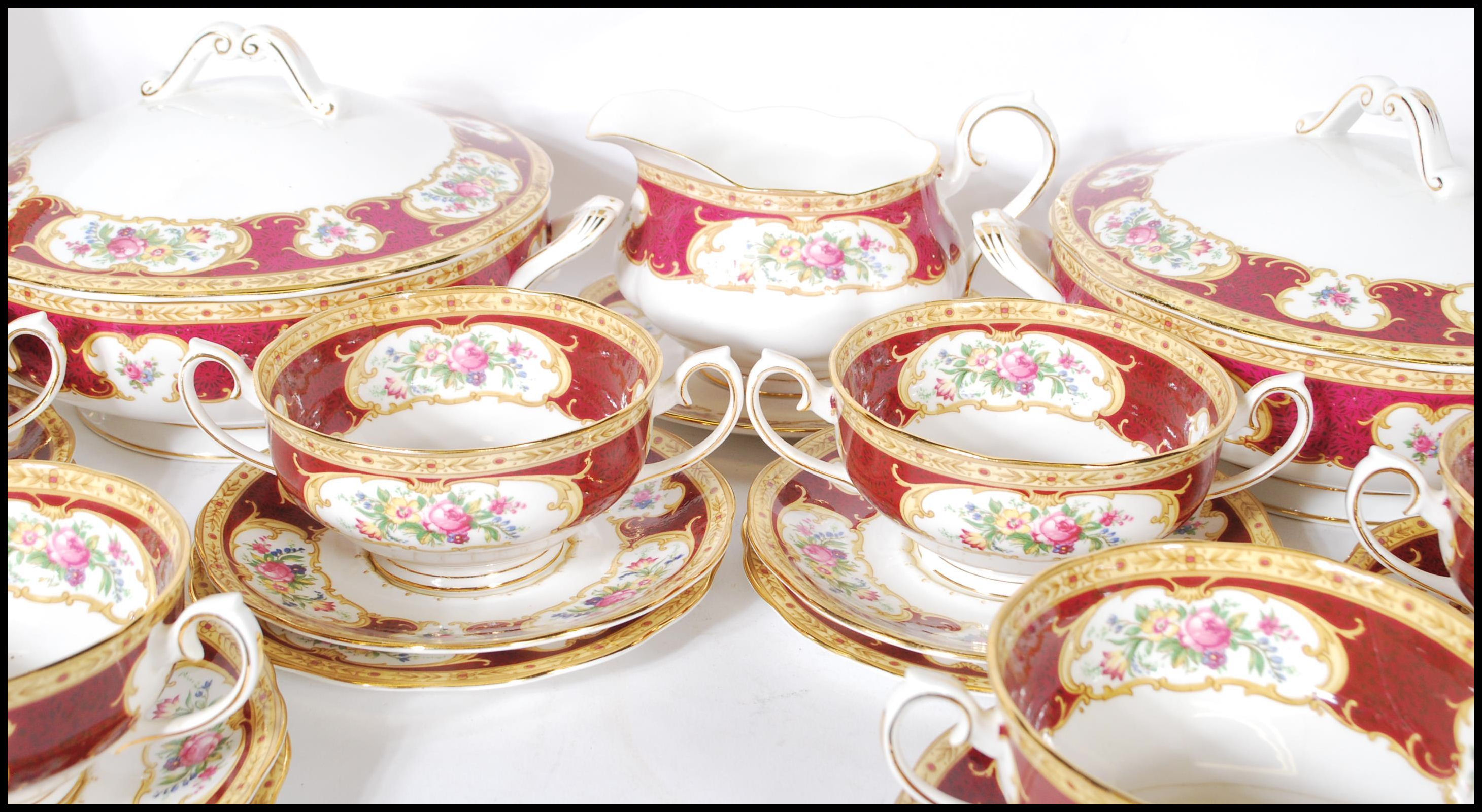 A Royal Albert bone China part dinner service in the Lady Hamilton pattern, comprising soup bowls, - Image 4 of 11