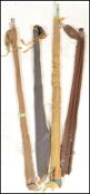A collection of four vintage fishing rods to include split cane, fly rods etc. All in original