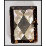 A late 19th Century / early 20th Century calling card case having a central mother of pearl panel