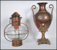 A vintage early 20th Century brass and copper ships lantern having a later conversion to electric