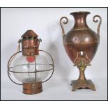 A vintage early 20th Century brass and copper ships lantern having a later conversion to electric