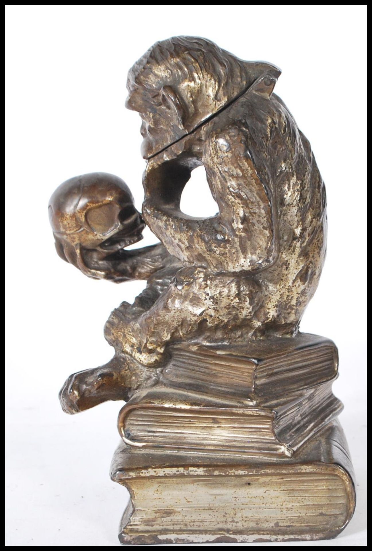 A Darwinian style cast metal novelty table cigarette / cigar lighter, in the form of a seated monkey - Image 5 of 8