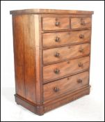 A 19th Century Victorian mahogany chest of drawers having  two small over four graduated drawers,