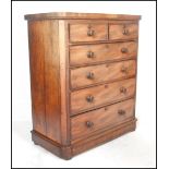 A 19th Century Victorian mahogany chest of drawers having  two small over four graduated drawers,