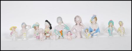 A selection of ceramic female form pin cushion tops / half dolls dating from the 19th Century,