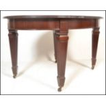 A  19th century good quality Victorian mahogany extending dining table. The oval top complete with