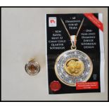 A 2012 new royal mint 22 carat gold Diamond Jubilee quarter sovereign pendant, having St George