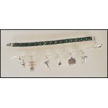 Two stamped 925 silver bracelets to include a spacer bracelet set with green stones ( measures 7