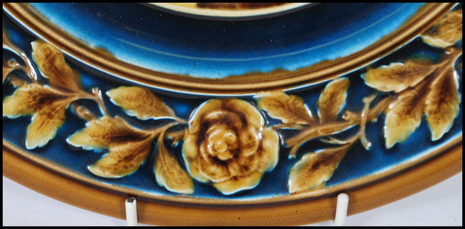 An Austrian 19th century porcelain wall charger having brown glaze with white cameo in relief centre - Bild 2 aus 6