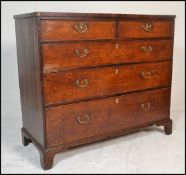 A good 18th / early 19th century large North Country cross banded chest of drawers . Raised on